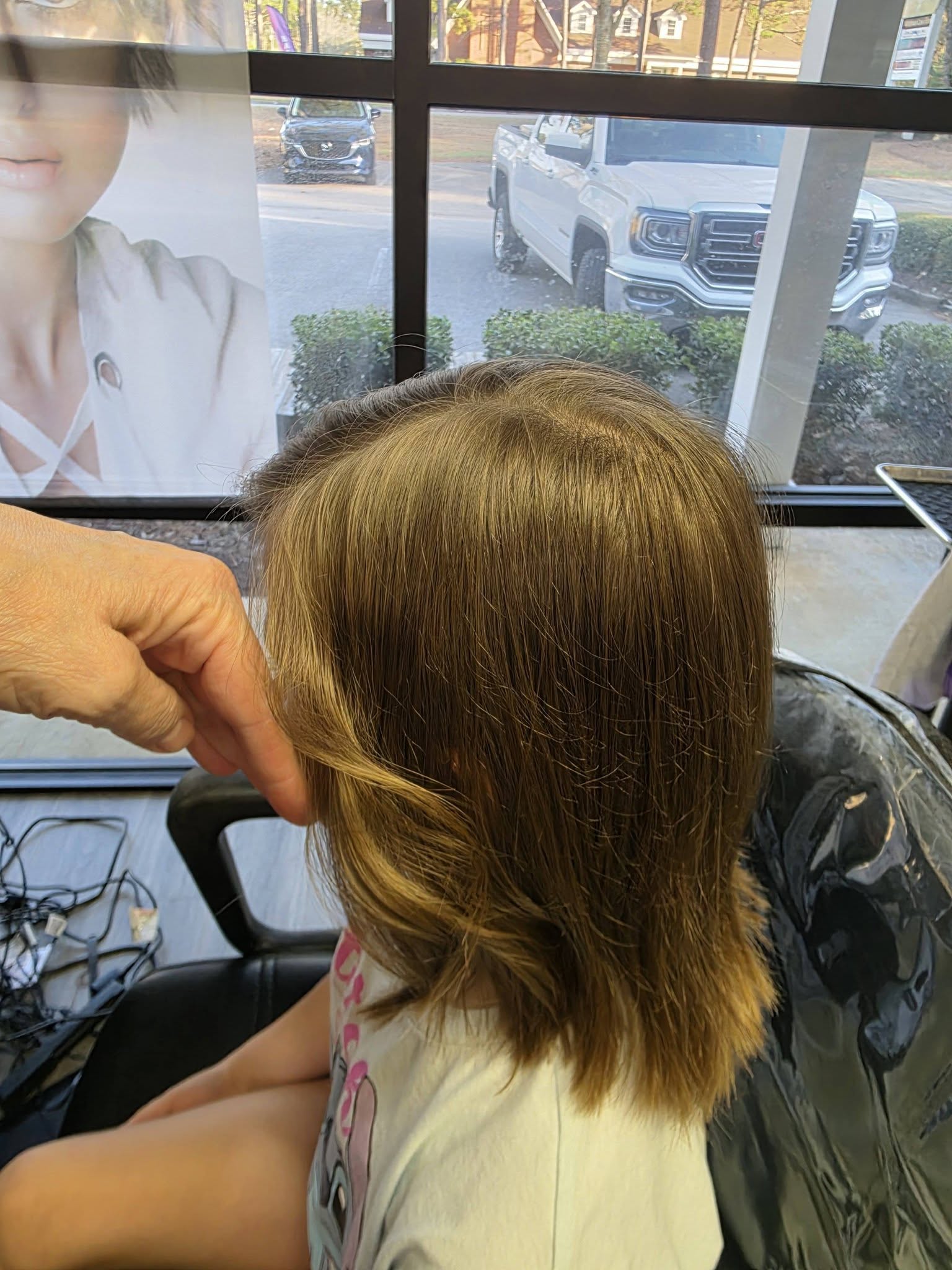 Blonde and braids style at Beach Cuts Hair Salon Shallotte NC